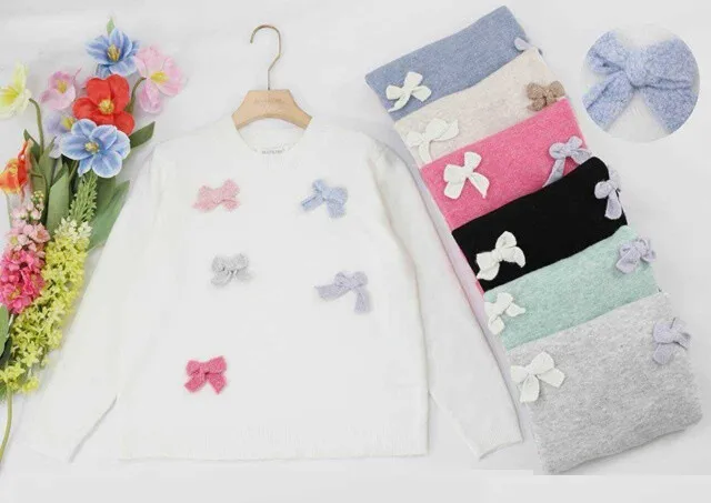 Mehrfarbiger Pullover mit Schleifenmuster